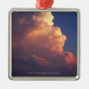 Clouds over sea at sunset metal ornament