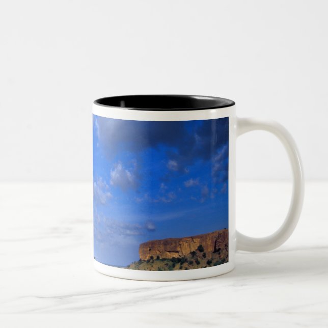 Clouds sweeping across the sky over the Two-Tone coffee mug (Right)