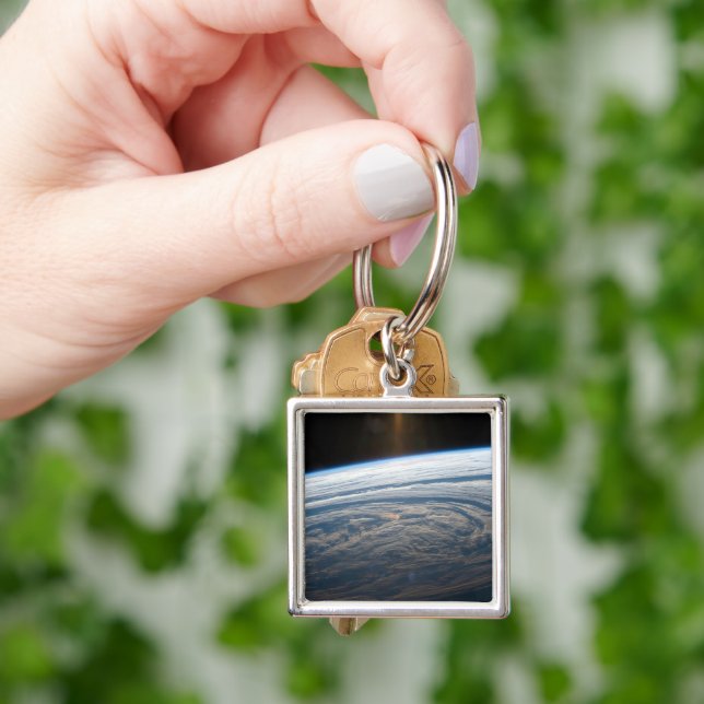 Cloudy Formations In The South Indian Ocean. Key Ring (Hand)