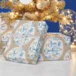 Coastal Beach Christmas SEAS & GREETINGS Wrapping Paper<br><div class="desc">Wrap your Christmas holiday gifts in coastal or beach flair using this roll of wrapping paper featuring a SEAS & GREETINGS elegant calligraphy script typography design accented with starfish in turquoise aqua blue on your choice of background colour (shown with a sandy brown colour). ASSISTANCE: For help with design modification...</div>