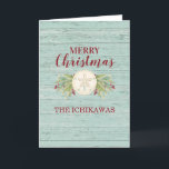 Coastal Beach Holiday Christmas Card<br><div class="desc">A rustic beach themed Christmas card decorated with a sand dollar and Christmas foliage. Personalise it with your name for Christmas this year! Designed for you by Blackberry Boulevard.</div>
