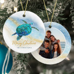 Coastal Beach Sea Turtle Merry Christmas Photo Ceramic Ornament<br><div class="desc">This coastal themed holiday ornament is easily personalised with family name on the front and a photo on the back, and features a watercolor turquoise blue sea turtle on an abstract beach background with a faux gold glitter sparkly wave, and gold Merry Christmas. Check out the collection for more matching...</div>