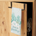 Coastal Beach SEAS & GREETINGS Turquoise Glitter Tea Towel<br><div class="desc">Coastal, beach or tropical Christmas holiday kitchen towel to decorate for the season or makes a great gift for those celebrating the holiday in a warm weather environment. The design features SEAS AND GREETINGS in modern calligraphy script typography in turquoise, aqua and teal watercolor with coral, starfish and sand dollars...</div>