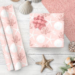 Coastal Christmas Rose Gold Starfish Sand Dollar Wrapping Paper<br><div class="desc">Beautiful coastal Christmas wrapping paper features a pattern of starfish,  sand dollars,  and glitter coral in a rose gold and pink colour scheme.
*If you would like this design on more products or need design help,  please contact me through Zazzle Chat.</div>