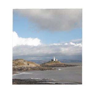 Coastal landscape and lighthouse notepad