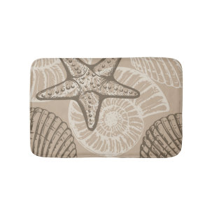 Coastal sealife starfish and shells in beige bath mat