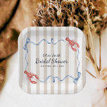 Coastal Theme She's a Catch Lobster Bridal Shower Paper Plate<br><div class="desc">Elevate your bridal shower with these charming "She's a Catch" lobster-themed paper plates! Featuring a beautiful watercolor design with red lobsters, flowing blue ribbons, bows, and classic beige stripes on a neutral background. Perfect for a nautical, coastal, beach, or summer bridal shower celebration. Playful pun design adds a fun touch...</div>