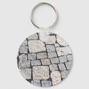 Cobblestones of a street in detail key ring