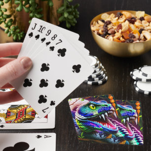 Cobra snake with vibrant turquoise and blue scales playing cards