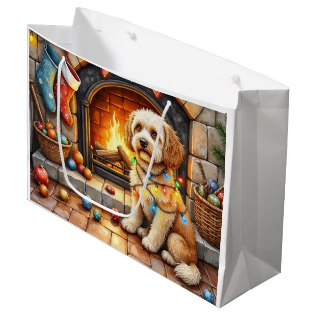 Cockapoo Sitting by Fireplace with Christmas Light Large Gift Bag (Front Angled)