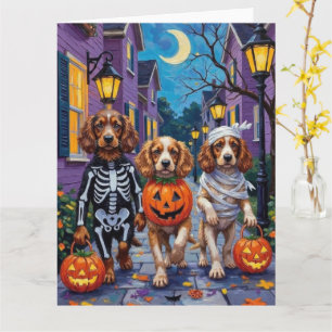Cocker Spaniel Dogs Trick-or-Treating in Halloween Card