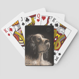 cocker spaniel playing poker cards