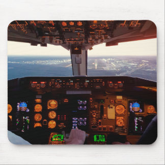 Cockpit view of commercial jet aeroplane landing o mouse pad