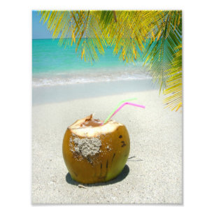 Coconut drink on tropical beach with palm leaves photo print