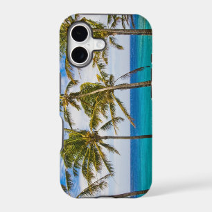 Coconut palm trees (Cocos nucifera) swaying in