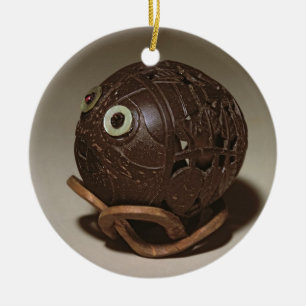 Coconut sculpted into a face, c.1895 ceramic ornament