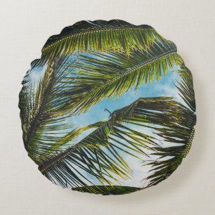 Coconut tree leaves under blue sky in the morning round cushion
