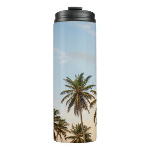 Coconut trees under cloudy sky in the morning thermal tumbler