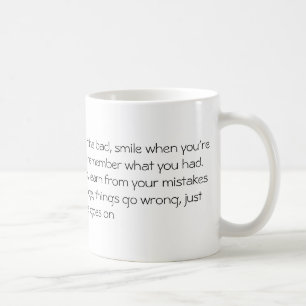 Coffee mug with A carpe diem writing.