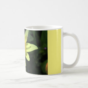 coffee mug with yellow wild flower