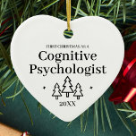 Cognitive Psychologist New Job Christmas Ceramic Ornament<br><div class="desc">First Christmas as a cognitive psychologist heart ornament for a coworker,  friend,  or family member. Elegant porcelain ceramic holiday ornaments in white with black lettering. Featuring Christmas trees and stars.</div>