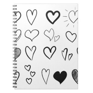 Collection of hand drawn hearts isolated on white notebook