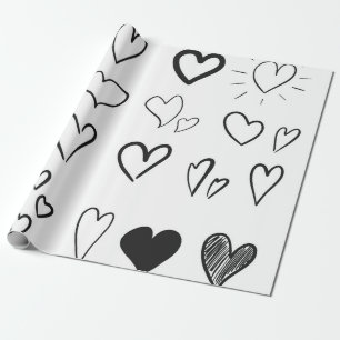 Collection of hand drawn hearts isolated on white wrapping paper