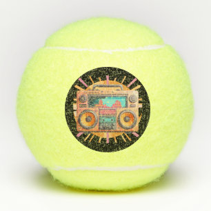 Coloful retro 80s boombox with a sunburst in the. tennis balls