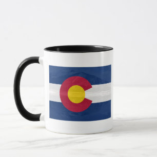 Colorado flag with mountain background mug