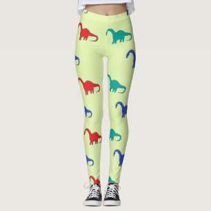 Colorful dino on green leggings