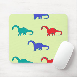 Colorful dino on green mouse pad