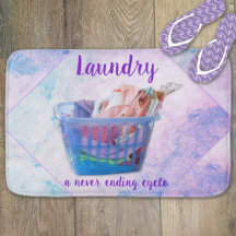 Colorful Folded Laundry On Hangers In Blue Basket