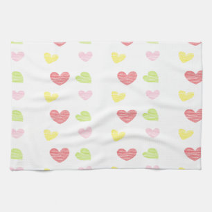 Colorful hearts on white tea towel