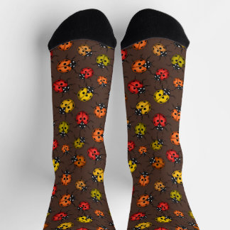 Colorful ladybugs on brown socks
