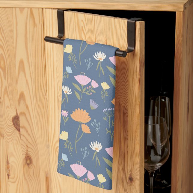 Colorful meadow on blue tea towel (Thirds Fold)