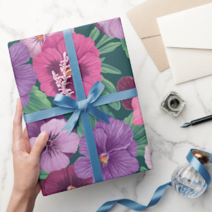 Colorful pansies on deep violet wrapping paper