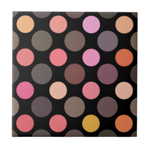 colorful polka dots on black ceramic tile