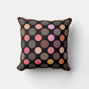 colorful polka dots on black cushion