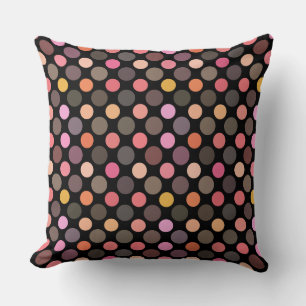 colorful polka dots on black cushion