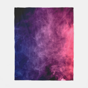 Colorful purple and blue smoke clouds on dark back fleece blanket