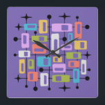 Colorful Retro Mid Century Modern Atomic Abstract Square Wall Clock<br><div class="desc">This artwork radiates mid-century modern energy, layering vibrant rectangles and squares of orange, green, blue, pink, purple, and white within a black grid of lines and dots. The composition is punctuated by playful black starbursts, evoking the optimism of the atomic age. Set against a deep purple background, the symmetry and...</div>