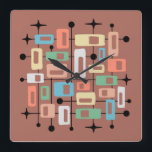 Colorful Retro Mid Century Modern Atomic Abstract Square Wall Clock<br><div class="desc">This artwork channels the mid-century modern spirit, weaving together rectangular blocks of muted peach, green, blue, beige, and white against a warm reddish-brown ground. Black lines and dots intersect the grid, evoking atomic-era networks, while scattered starburst shapes punctuate the composition with playful energy. The balance of geometry and whimsy captures...</div>