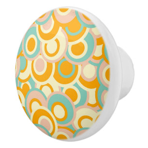 Colorful retro pattern in pastel shades of orange ceramic knob