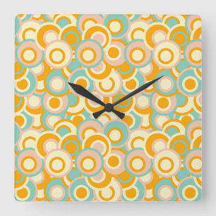 Colorful retro pattern in pastel shades of orange square wall clock