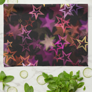 Colorful Stars Dance Whimsically Tea Towel