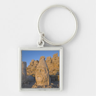 Colossal head statues of Gods guarding the Key Ring