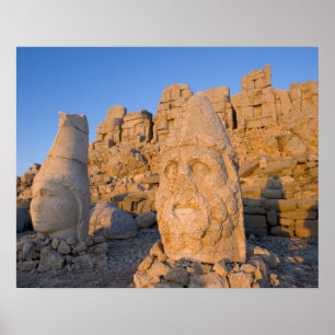 Colossal head statues of Gods guarding the Poster