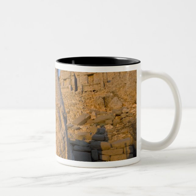 Colossal head statues of Gods guarding the Two-Tone Coffee Mug (Right)