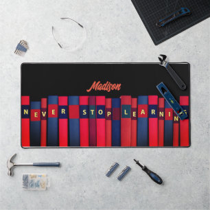 Coloured books, your name, professional desk mat