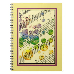 Coloured bubbles and music notebook